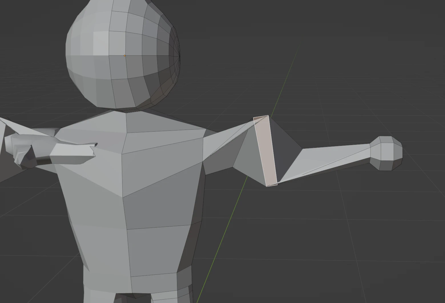 The left arm of the character, with a face twisted to suggest that the arm has been broken